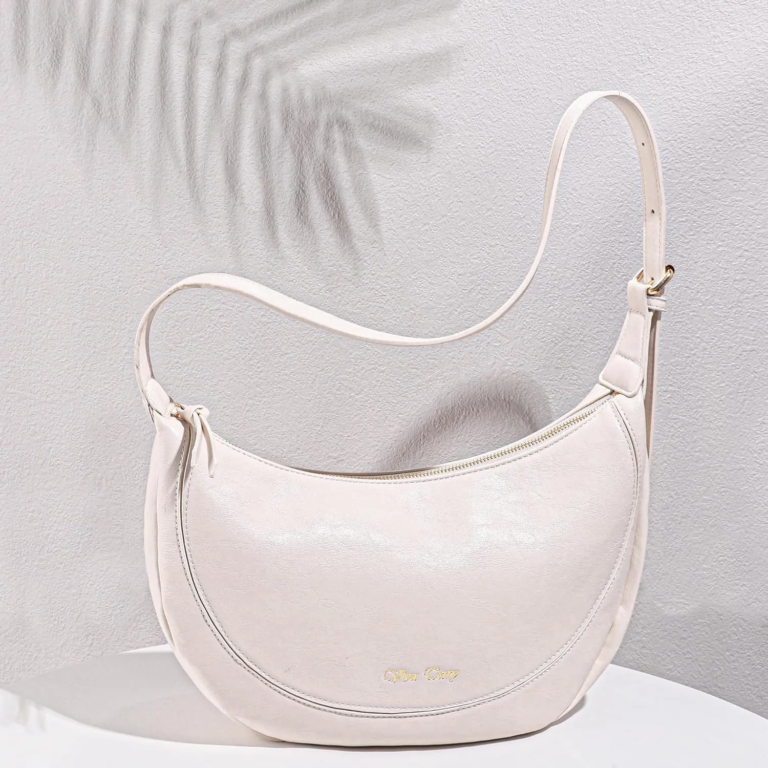 Viva Terry Vegan Leather Crescent Bag Casual Shoulder Purse and Handbag for Women with Adjustable Strap and Tassel